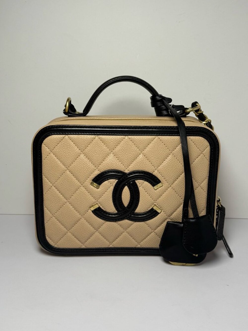Chanel CC Filigree Vanity Case Beige & Black Caviar Calfskin Top‑Handle Crossbod